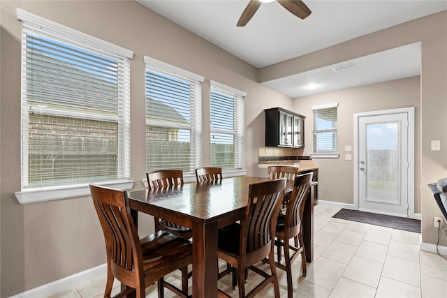 19647 Travis Cannon Ln, Richmond, TX 77407 - dining room featuring ceiling fan and light tile patterned floors