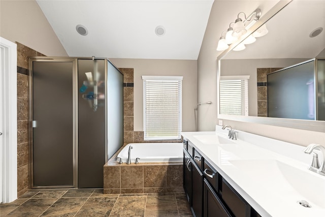 19647 Travis Cannon Ln, Richmond, TX 77407 - bathroom with double vanity, a shower stall, vaulted ceiling, and a bath