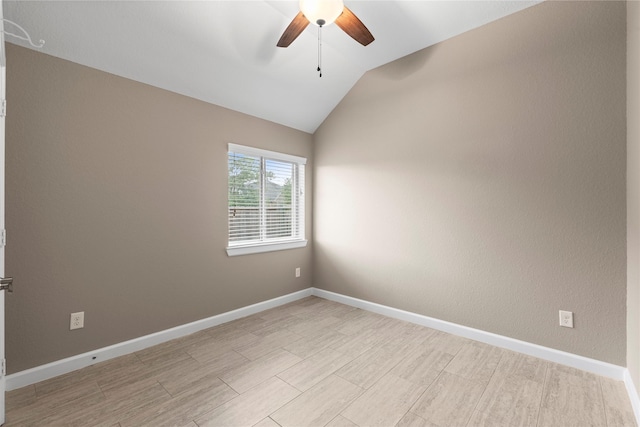 19647 Travis Cannon Ln, Richmond, TX 77407 - spare room featuring ceiling fan, vaulted ceiling, and light wood-style floors