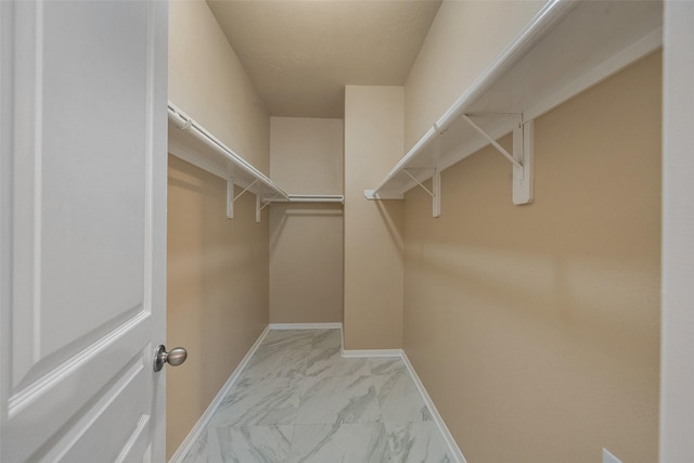 17415 Blackstone Trails Dr, Humble, TX 77396 - spacious closet featuring marble look tile flooring
