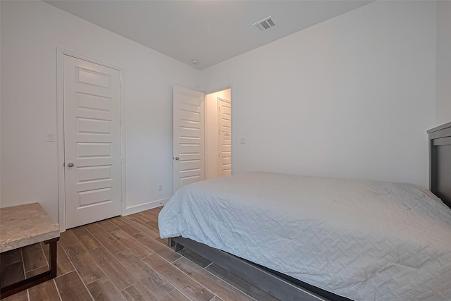 7246 Monarch Dr, Katy, TX 77493 - bedroom featuring dark wood-type flooring and baseboards
