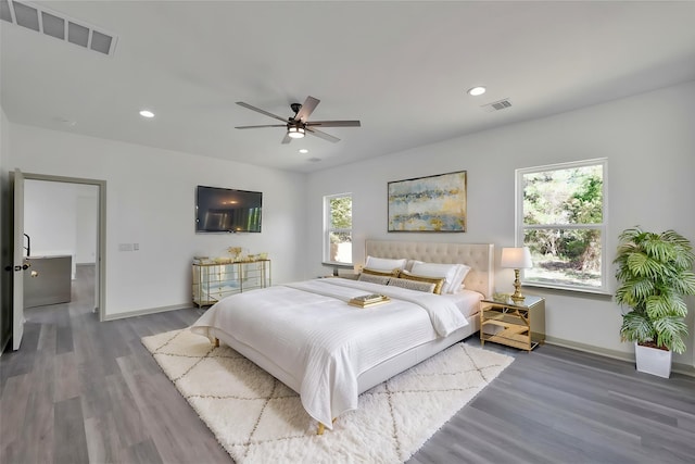 4 Hanover Ln, Panorama Village, TX 77304 - bedroom with wood finished floors, recessed lighting, and ceiling fan