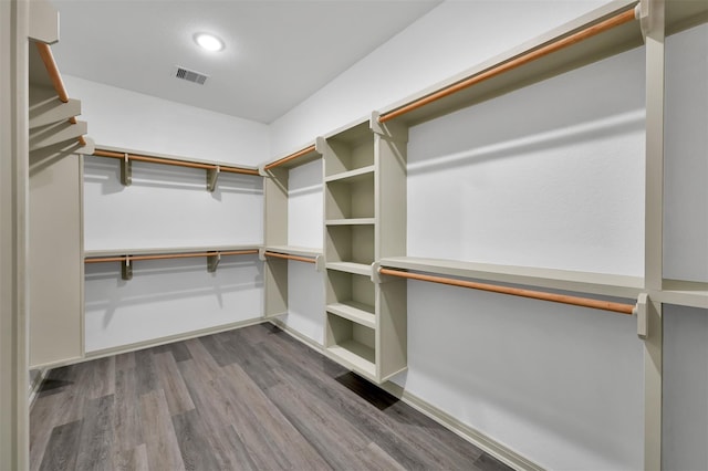 4 Hanover Ln, Panorama Village, TX 77304 - spacious closet featuring dark wood-style flooring