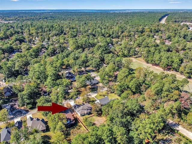 4 Hanover Ln, Panorama Village, TX 77304 - aerial overview of property's location with a heavily wooded area