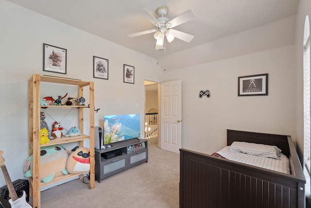 23 Murmuring Creek Pl, The Woodlands, TX 77385 - bedroom with light colored carpet and a ceiling fan