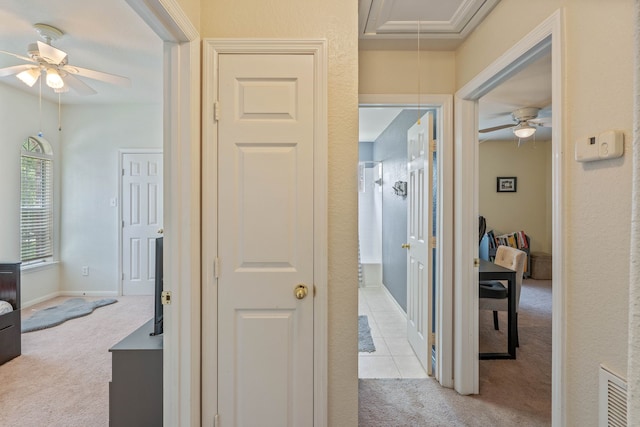 23 Murmuring Creek Pl, The Woodlands, TX 77385 - corridor featuring light carpet and attic access