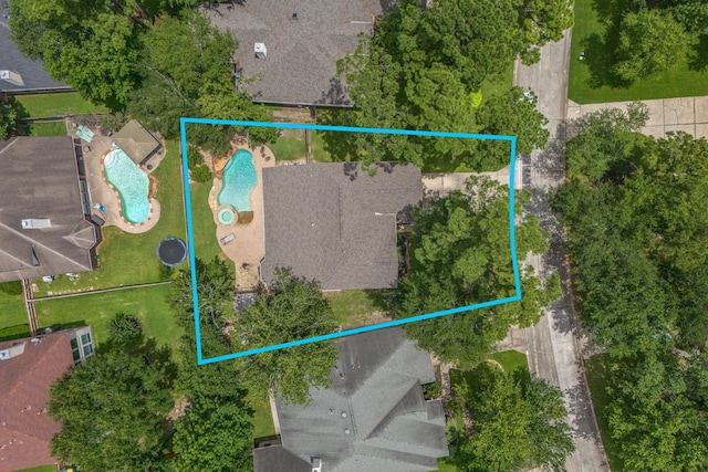 23 Murmuring Creek Pl, The Woodlands, TX 77385 - bird's eye view of a pool