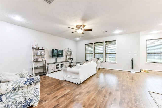 10147 Cimarron Canyon Ln, Magnolia, TX 77354 - living room with a ceiling fan, wood finished floors, healthy amount of natural light, and recessed lighting