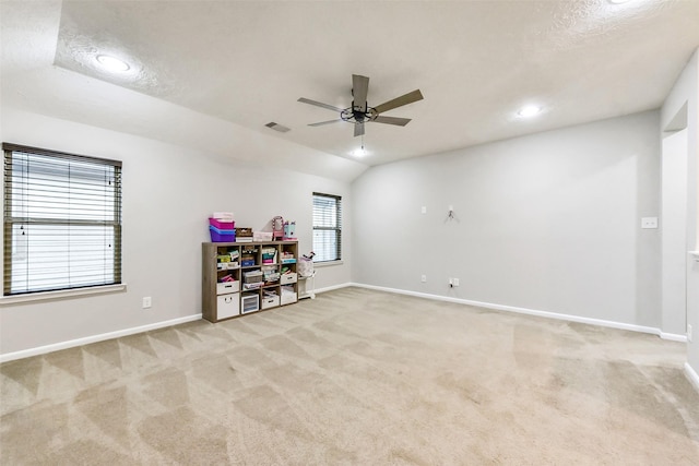 10147 Cimarron Canyon Ln, Magnolia, TX 77354 - spare room featuring light colored carpet, ceiling fan, recessed lighting, and vaulted ceiling