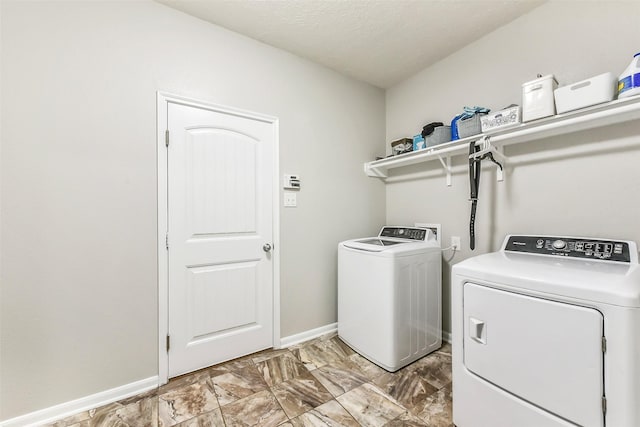 10147 Cimarron Canyon Ln, Magnolia, TX 77354 - washroom featuring independent washer and dryer and light marble finish flooring