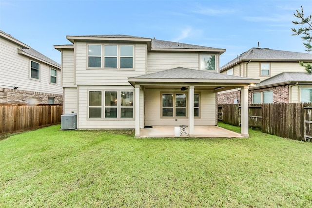 10147 Cimarron Canyon Ln, Magnolia, TX 77354 - rear view of house with a patio area, a fenced backyard, and roof with shingles