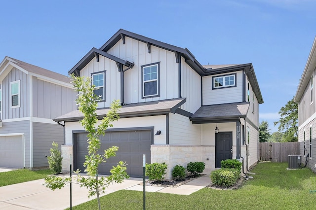 11739 Armadale Dr, Tomball, TX 77375 - view of front of home with a garage, board and batten siding, and concrete driveway