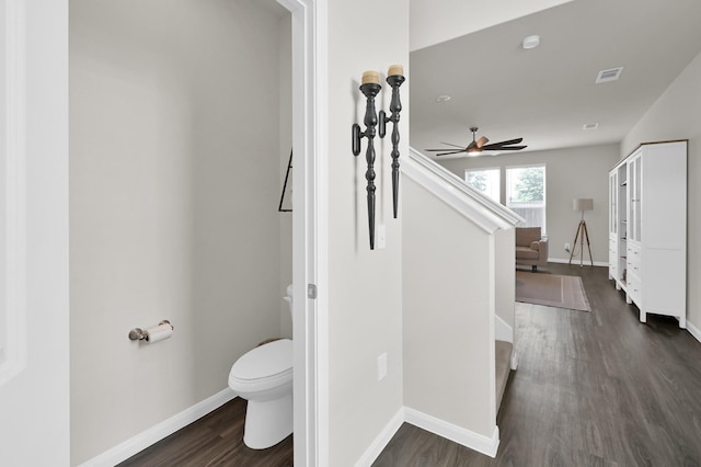 11739 Armadale Dr, Tomball, TX 77375 - hallway featuring dark wood-style floors and baseboards