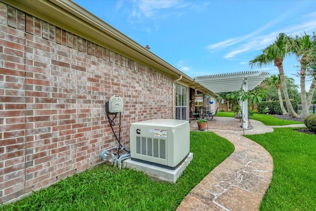 2316 Flagship Ct, League City, TX 77573 - view of green lawn featuring a patio