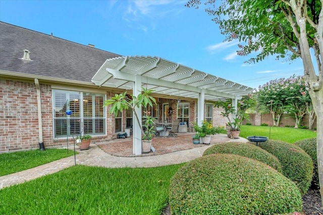 2316 Flagship Ct, League City, TX 77573 - rear view of property with a pergola, brick siding, a patio, a shingled roof, and a lawn