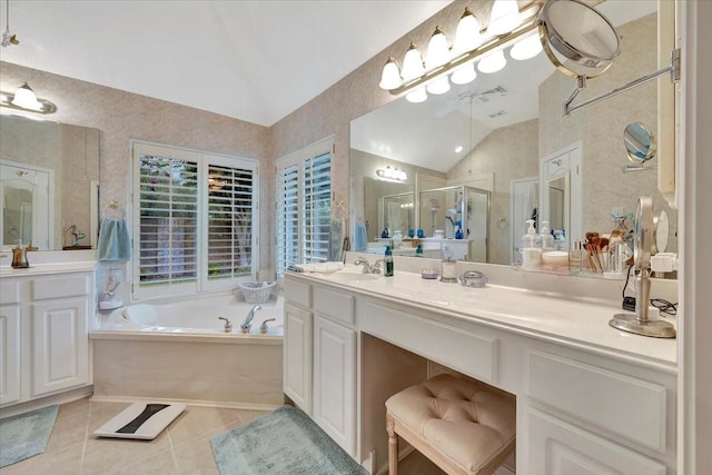 2316 Flagship Ct, League City, TX 77573 - bathroom featuring vaulted ceiling, a shower stall, a bath, tile patterned floors, and vanity