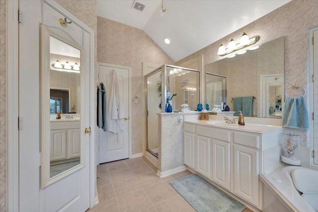 2316 Flagship Ct, League City, TX 77573 - full bath featuring lofted ceiling, a shower stall, tile patterned floors, vanity, and a garden tub