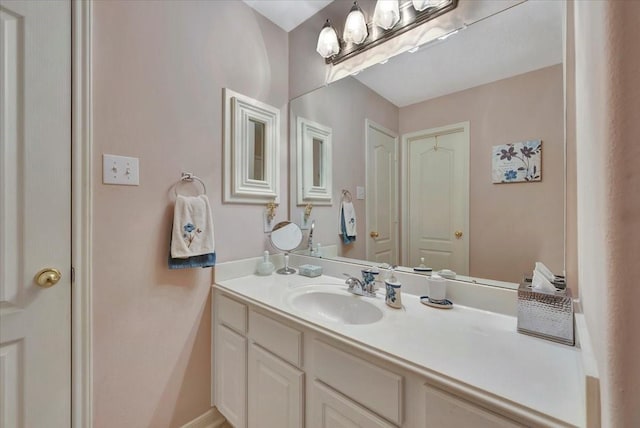 2316 Flagship Ct, League City, TX 77573 - bathroom with vanity and baseboards