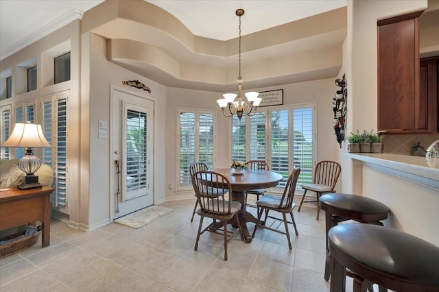2316 Flagship Ct, League City, TX 77573 - dining area featuring a chandelier, plenty of natural light, and light tile patterned flooring