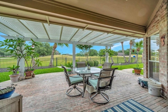 2316 Flagship Ct, League City, TX 77573 - fenced backyard featuring a pergola, outdoor dining space, and a patio area