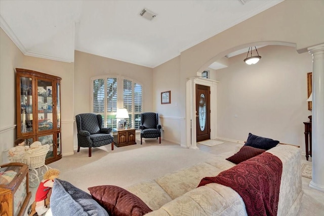 2316 Flagship Ct, League City, TX 77573 - living room featuring decorative columns, arched walkways, light carpet, and ornamental molding