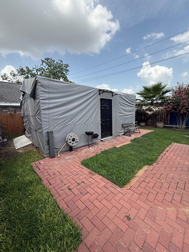 7402 Burkridge Dr, Houston, TX 77041 - view of patio / terrace featuring a storage shed
