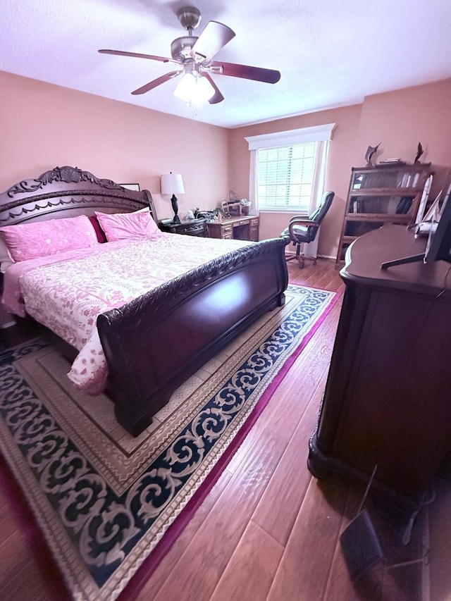 7402 Burkridge Dr, Houston, TX 77041 - bedroom featuring ceiling fan and wood finished floors