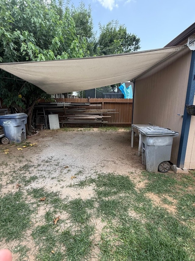 7402 Burkridge Dr, Houston, TX 77041 - view of parking featuring a carport