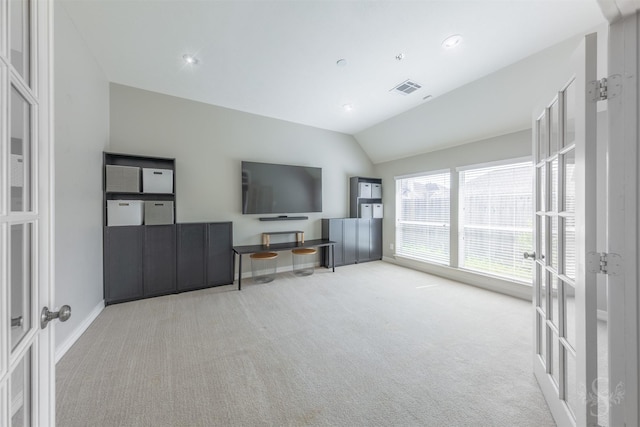 4611 Camden Brook Ln, Katy, TX 77494 - living room with carpet flooring, lofted ceiling, french doors, and recessed lighting