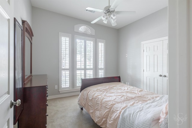 4611 Camden Brook Ln, Katy, TX 77494 - bedroom featuring multiple windows, carpet flooring, a closet, and ceiling fan