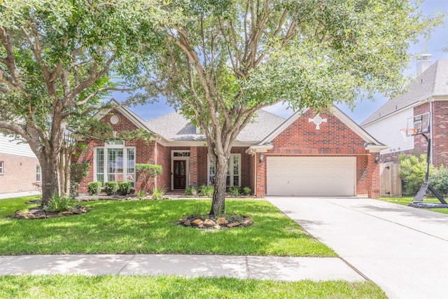 4611 Camden Brook Ln, Katy, TX 77494 - traditional-style house with brick siding, an attached garage, a front lawn, and driveway