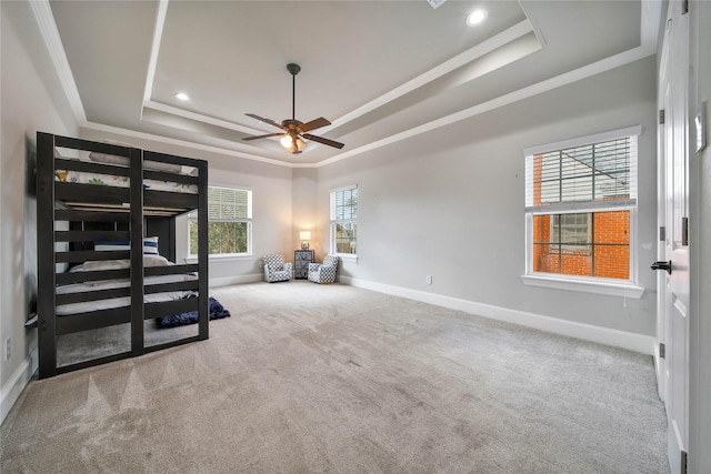 3327 Palm St, Houston, TX 77004 - unfurnished bedroom with a tray ceiling, ornamental molding, carpet flooring, recessed lighting, and ceiling fan
