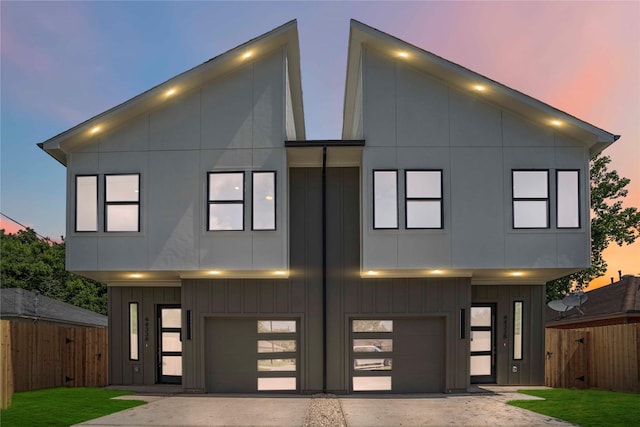 4505 Phlox St, Houston, TX 77051 - modern home featuring a garage, driveway, and board and batten siding