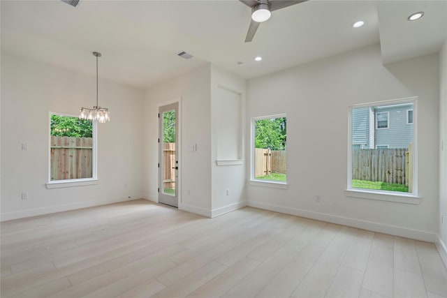 4505 Phlox St, Houston, TX 77051 - spare room featuring light wood-style floors, a chandelier, a ceiling fan, and recessed lighting