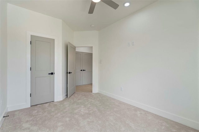 4505 Phlox St, Houston, TX 77051 - unfurnished bedroom with light colored carpet, recessed lighting, and ceiling fan
