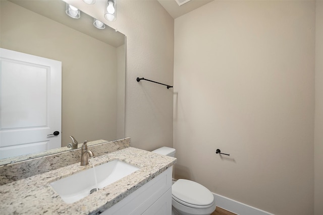 735 20th St, Hempstead, TX 77445 - half bathroom featuring toilet and vanity