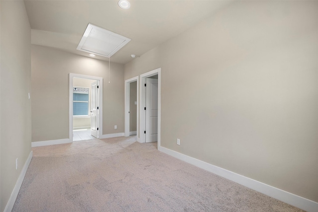 735 20th St, Hempstead, TX 77445 - empty room with attic access, light carpet, and recessed lighting