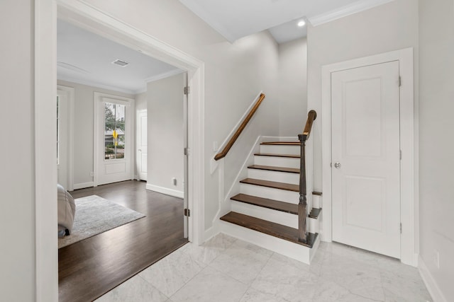 1801 Ashland St, Houston, TX 77008 - foyer featuring crown molding and stairs