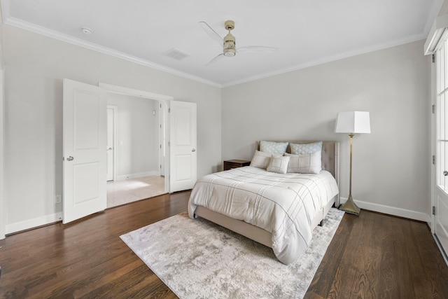 1801 Ashland St, Houston, TX 77008 - bedroom with crown molding, dark wood-style flooring, and a ceiling fan