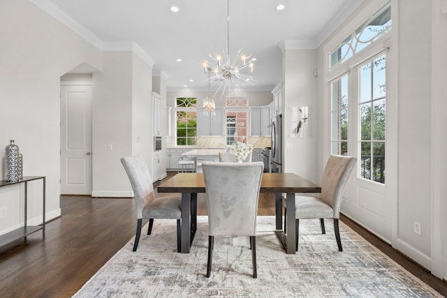 1801 Ashland St, Houston, TX 77008 - dining area featuring a chandelier, dark wood-style flooring, plenty of natural light, recessed lighting, and crown molding