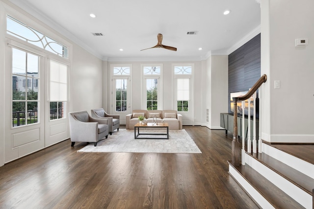 1801 Ashland St, Houston, TX 77008 - living area featuring ornamental molding, recessed lighting, dark wood finished floors, a ceiling fan, and stairway
