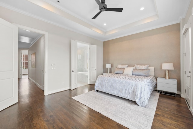 1801 Ashland St, Houston, TX 77008 - bedroom featuring dark wood-style floors, ornamental molding, a tray ceiling, ensuite bath, and recessed lighting
