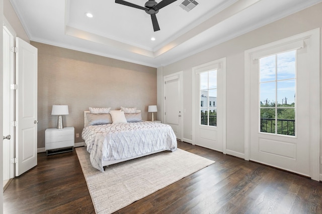 1801 Ashland St, Houston, TX 77008 - bedroom with multiple windows, a raised ceiling, dark wood-style floors, recessed lighting, and ornamental molding