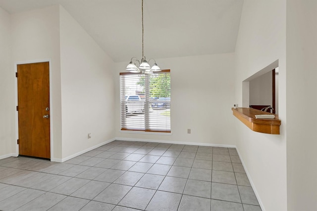 4418 Talina Way, Houston, TX 77041 - unfurnished dining area with a chandelier, light tile patterned floors, and high vaulted ceiling