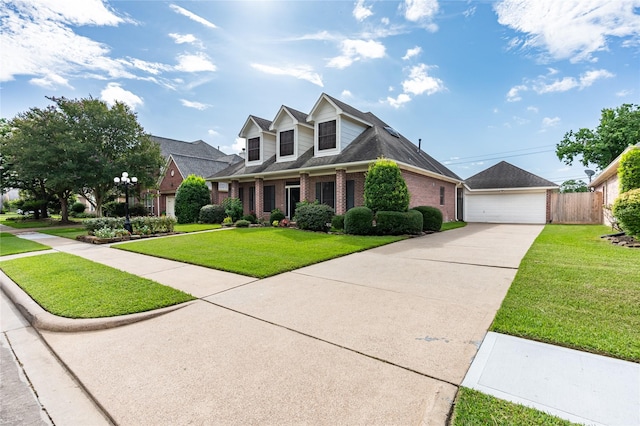 2603 Piney Woods Dr, Pearland, TX 77581 - cape cod home featuring brick siding and a detached garage
