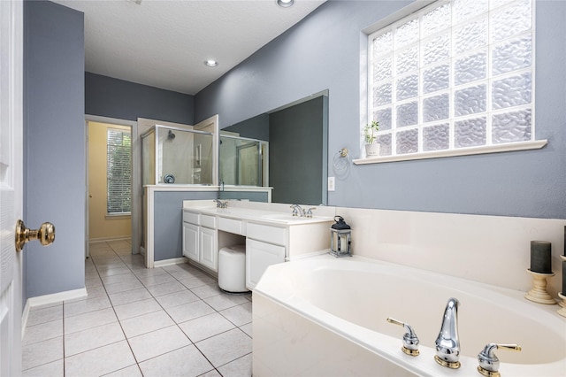 2603 Piney Woods Dr, Pearland, TX 77581 - full bathroom with a bath, a stall shower, tile patterned floors, double vanity, and recessed lighting