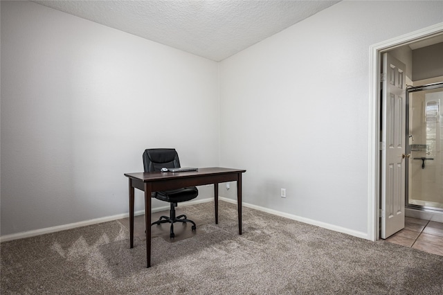 2603 Piney Woods Dr, Pearland, TX 77581 - carpeted home office with a textured ceiling and baseboards