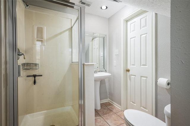 2603 Piney Woods Dr, Pearland, TX 77581 - bathroom with a stall shower and tile patterned floors