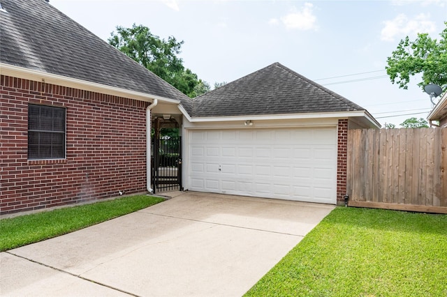 2603 Piney Woods Dr, Pearland, TX 77581 - view of front of property featuring a shingled roof, brick siding, driveway, and a garage