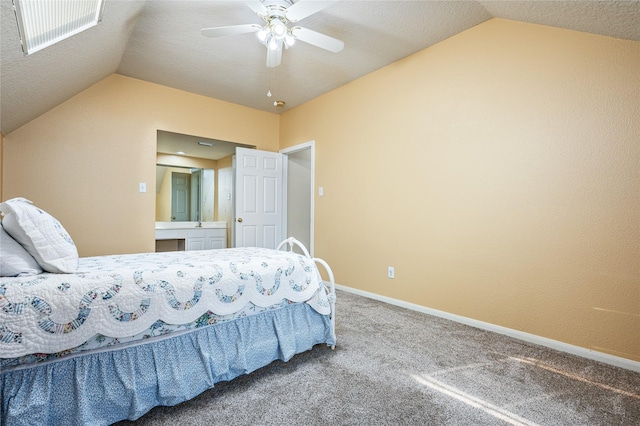 2603 Piney Woods Dr, Pearland, TX 77581 - carpeted bedroom with vaulted ceiling, a ceiling fan, and ensuite bathroom